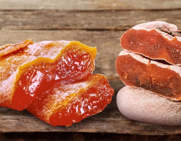 掰开富平柿饼,能看到像溏心一样澄黄透亮的果肉,一副几乎要"流"出来的