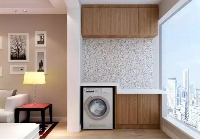 用洗衣机罩,布帘加以遮盖,规划一个尺寸合适的的角落放置洗衣机
